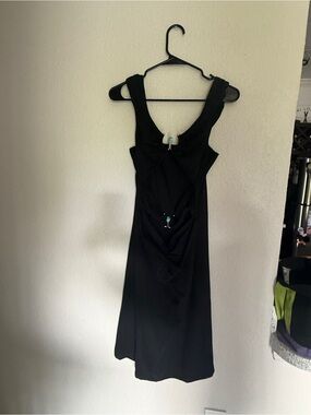 Elegant Black Sleeveless Dress with Accent Details